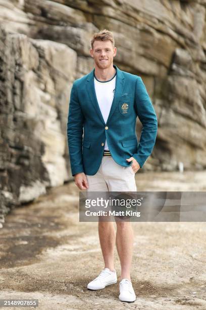 Australian athlete Tom Green poses during the Australian 2024 Paris Olympic Games Official Uniform Launch at Clovelly Surf Club on April 17, 2024 in...