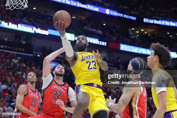 LeBron James of the Los Angeles Lakers shoots against Larry Nance Jr. #22 of the New Orleans Pelicans during the second half of a play-in tournament...