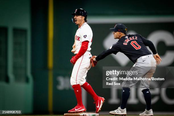 David Hamilton of the Boston Red Sox reacts after hitting a double during the tenth inning of a game against the Cleveland Guardians on April 16,...