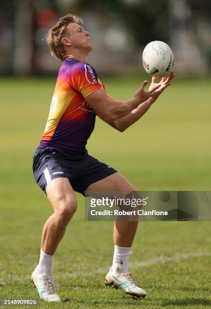 Tyran Wishart of the Storm takes the ball during a Melbourne Storm NRL training session at Gosch's Paddock on April 17, 2024 in Melbourne, Australia.
