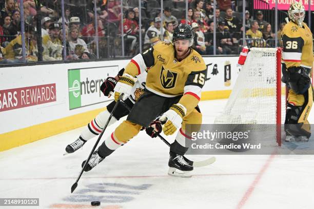 Noah Hanifin of the Vegas Golden Knights skates with the puck against the Chicago Blackhawks in the first period at T-Mobile Arena on April 16, 2024...