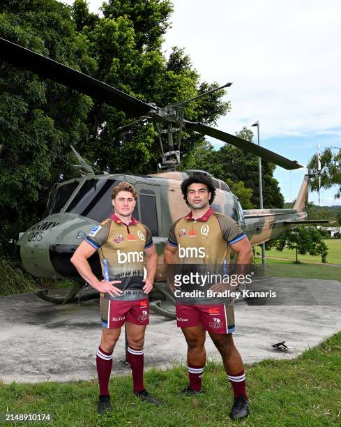 James O'Connor and Zane Nonggorr pose for a photo during the unveiling of the Queensland Reds 2024 ANZAC jersey at Enoggera Barracks on April 17,...