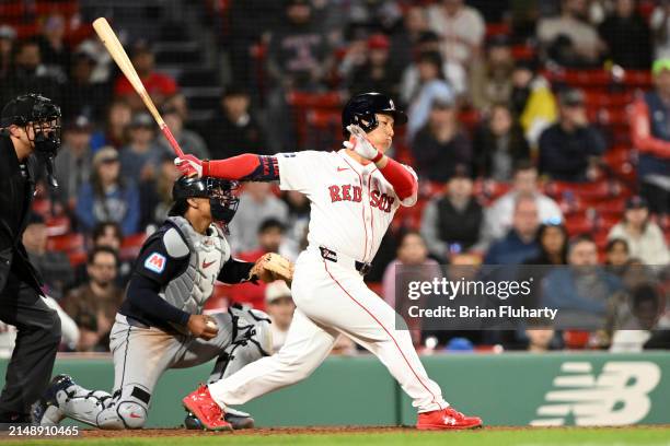 Masataka Yoshida of the Boston Red Sox strikes out against the Cleveland Guardians in the 11th inning at Fenway Park on April 16, 2024 in Boston,...