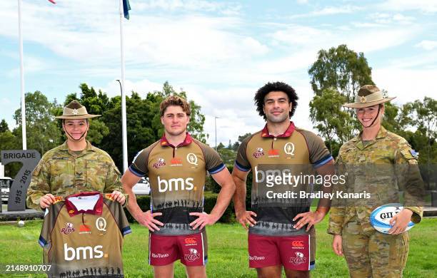 Bree-Anna Cheatham, James O'Connor, Zane Nonggorr and Deni Ross pose for a photo during the unveiling of the Queensland Reds 2024 ANZAC jersey at...
