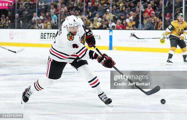 Seth Jones of the Chicago Blackhawks shoots the puck during the second period against the Vegas Golden Knights at T-Mobile Arena on April 16, 2024 in...