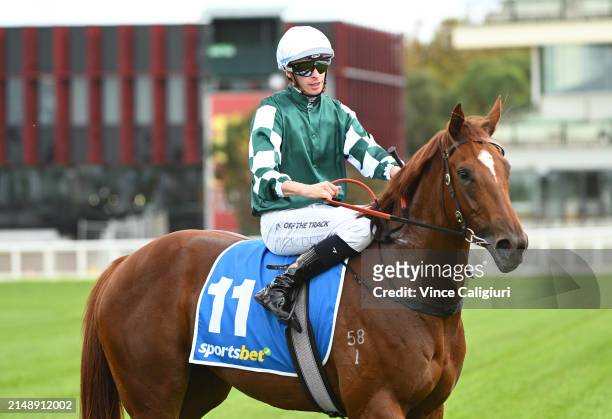 Michael Dee riding Rich Dottie after winning race 1, the Sportsbet Fast Form Handicap during Melbourne Racing at Caulfield Heath Racecourse on April...
