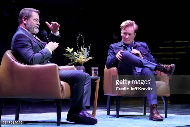 Nick Offerman and Conan O'Brien speak onstage during the Photo Call For Los Angeles premiere of "Conan O'Brien Must Go" at Avalon Hollywood & Bardot...