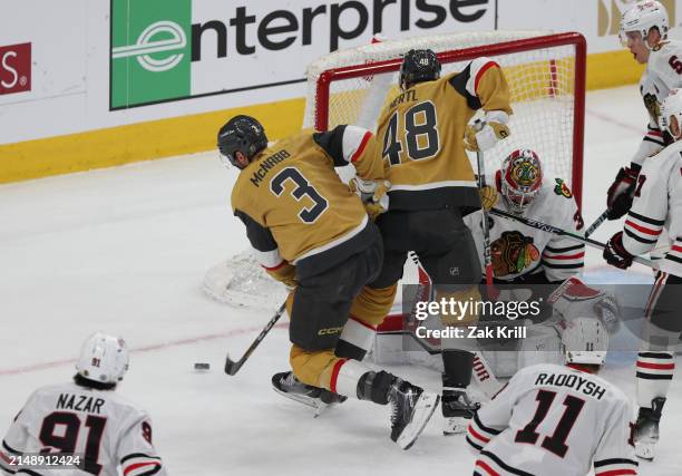 Brayden McNabb of the Vegas Golden Knights scores a goal against Petr Mrazek of the Chicago Blackhawks during the second period at T-Mobile Arena on...