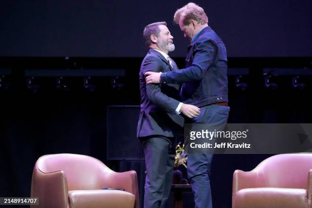 Nick Offerman and Conan O'Brien appear onstage during the Photo Call For Los Angeles premiere of "Conan O'Brien Must Go" at Avalon Hollywood & Bardot...