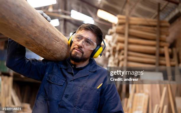 Log Man 716 Man Carrying Log Stock Photos, High-Res Pictures, and Images ...