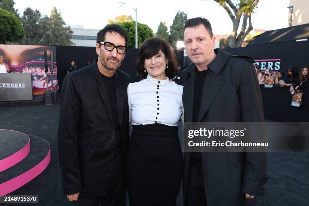 Trent Reznor, producer Amy Pascal and Atticus Ross attend the Los Angeles Premiere of Amazon MGM Studios' "Challengers" at Regency Village Theatre on...