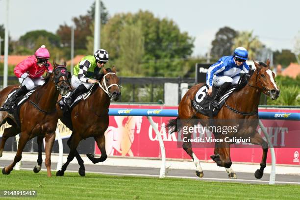 Carleen Hefel riding Here The Crowd winning Race 2, the Mrc Foundation Win A Mazda Cx-3 Pla during Melbourne Racing at Caulfield Heath Racecourse on...
