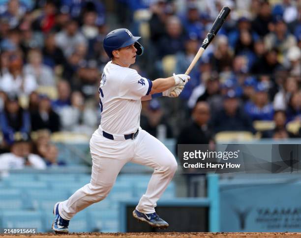 Will Smith of the Los Angeles Dodgers hits an RBI single during a 6-3 loss to the San Diego Padres at Dodger Stadium on April 14, 2024 in Los...