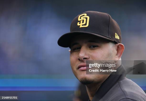 Manny Machado of the San Diego Padres smiles in the dugout during a 6-3 win over the Los Angeles Dodgers at Dodger Stadium on April 14, 2024 in Los...