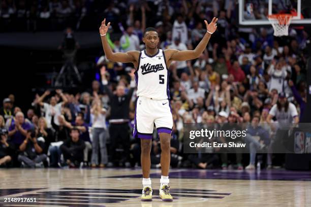 De'Aaron Fox of the Sacramento Kings reacts after the Kings made a basket against the Golden State Warriors in the second half during the Play-In...