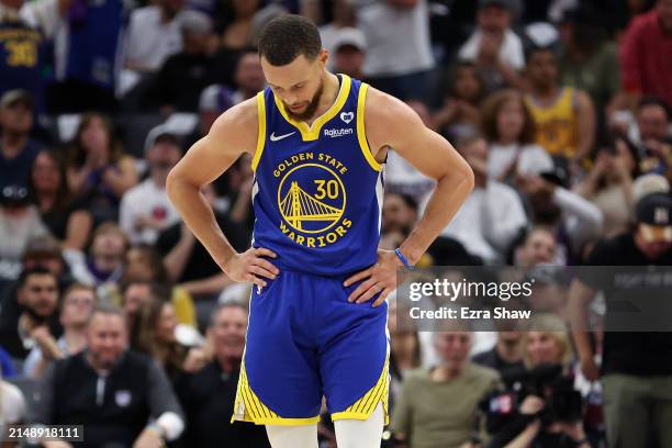 Stephen Curry of the Golden State Warriors stands on the court during the second half of their loss to the Sacramento Kings during the Play-In...