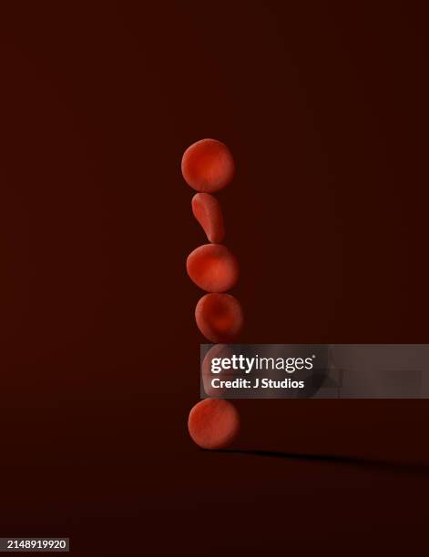 six red blood cells stacked on top of eachother - hematology stock pictures, royalty-free photos & images