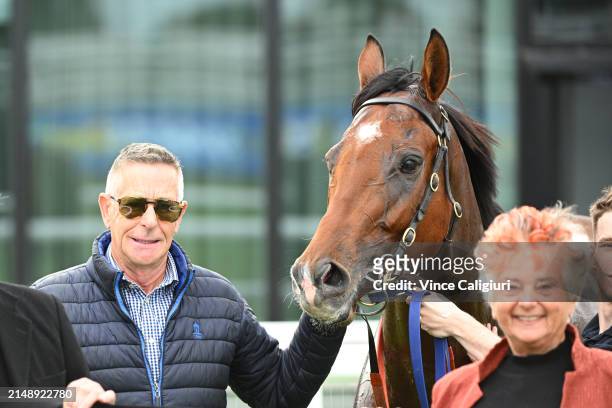 Trainer Michael Kent poses with Steel Run after winning Race 3, the Sportsbet Set A Deposit Limit Plate during Melbourne Racing at Caulfield Heath...