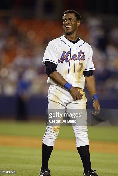 Shortstop Jose Reyes of the New York Mets celebrates after hitting a two run double off Montreal Expos pitcher Scott Stewart in the 7th inning during...