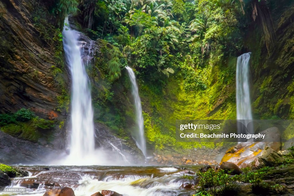 Midday view of Three Sisters Waterfall in Long San in Sarawak, Malaysia
