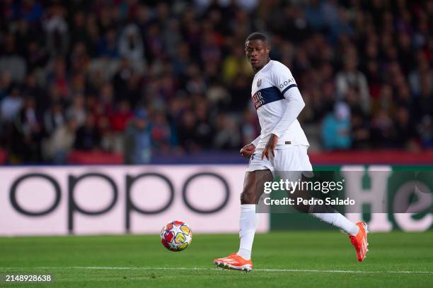 Nuno Mendes of Paris Saint-Germain with the ball during the UEFA Champions League quarter-final second leg match between FC Barcelona and Paris...