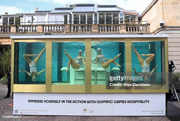 Synchronized swimmers are seen performing a routine as Dame Laura Kenny attends the synchronized swimming event by On Location celebrating 100 days...