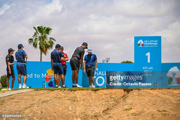 Players prepares to tees on the 1st hole prior to the Abu Dhabi Challenge at Al Ain Equestrian, Shooting and Golf Club on April 17, 2024 in Abu...