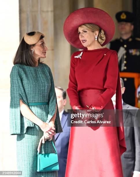 Queen Letizia of Spain speaks with Queen Máxima of the Netherlands as they attend the Welcome Ceremony during day two of her visit to the Netherlands...