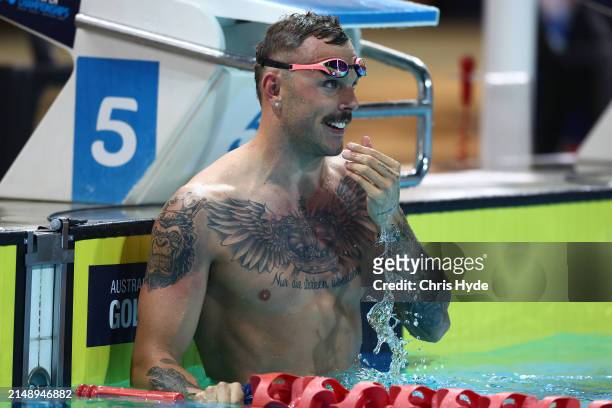 Kyle Chalmers celebrates winning the Men's Open 50m Butterfly Final during the 2024 Australian Open Swimming Championships at Gold Coast Aquatic...