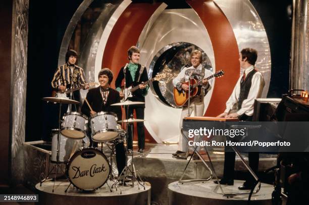 English pop group The Dave Clark Five perform on the set of a pop music television show in London circa 1968. Members of the band are, from left,...