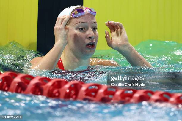 Mollie O'Callaghan celebrates winning the Women’s Open 100m Freestyle Final during the 2024 Australian Open Swimming Championships at Gold Coast...