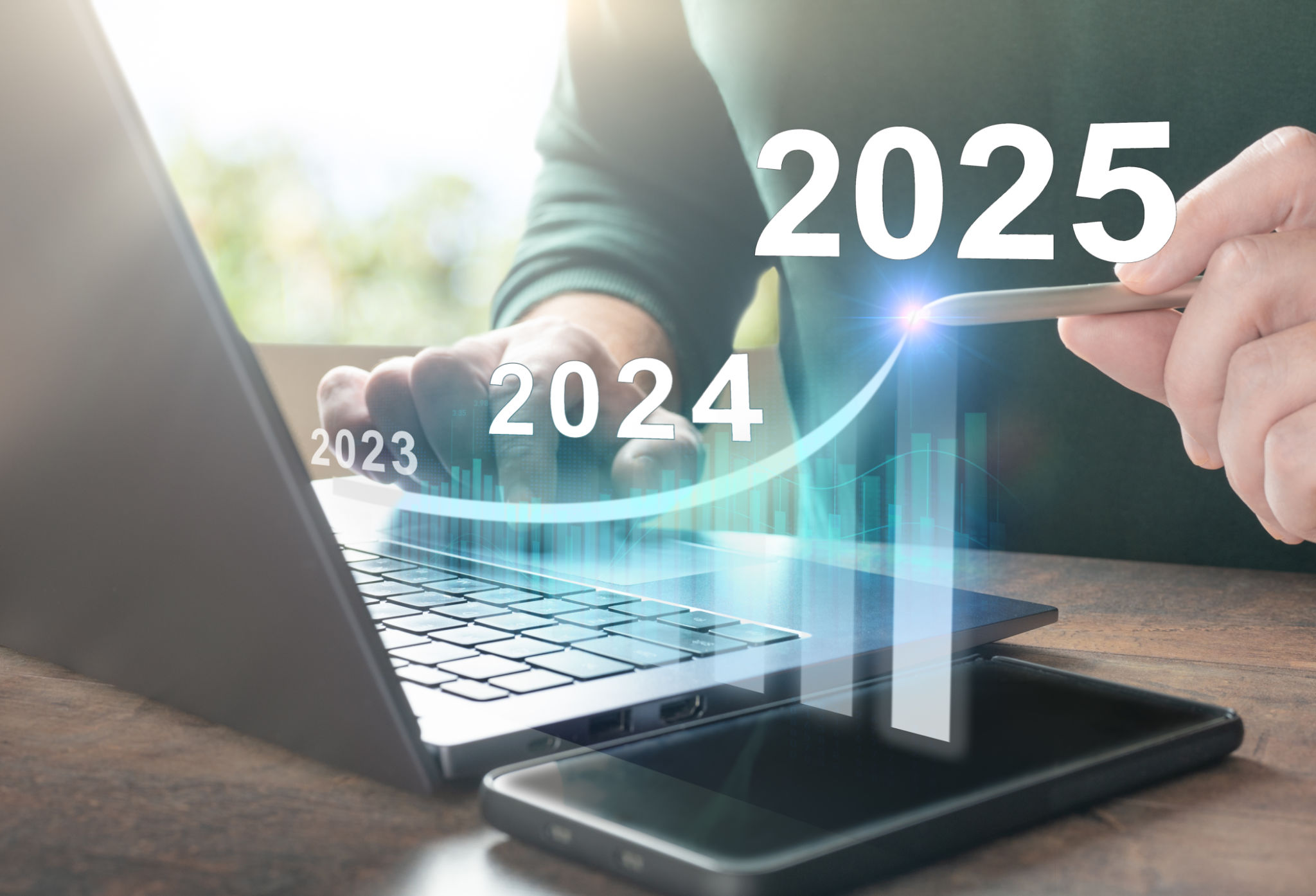 2025 new year. Business plan 2025 new year. Man working on laptop with growth chart 2025. Start new year 2025 with goal plan, goal concept, action plan, strategy, new year business vision. 2025 new year. Business plan 2025 new year. Man working on laptop with growth chart 2025. Start new year 2025 with goal plan, goal concept, action plan, strategy, new year business vision.