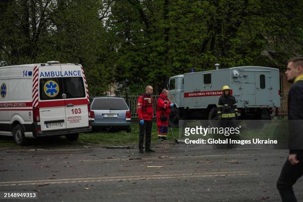 Rescuers work at the site of missile hit at residential district on April 17, 2024 in Chernihiv, Ukraine. Russian forces launched three missile...