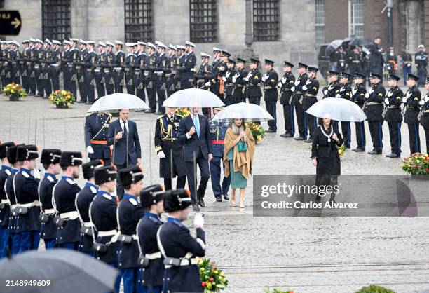 King Felipe VI of Spain and Queen Letizia of Spain attend a wreath laying ceremony in front of the National Monument in honour of the Dutch victims...