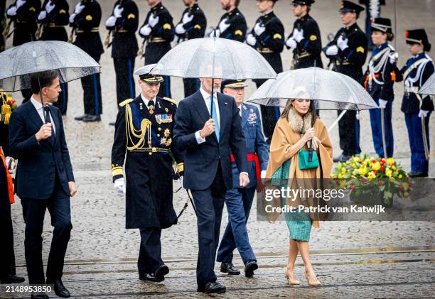 King Felipe of Spain and Queen Leticia of Spain during a wreath laying ceremony at the Dam Square on April 17, 2024 in Amsterdam, Netherlands. The...