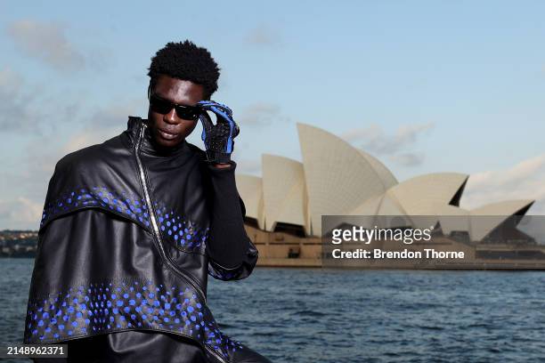 Model poses in a designs by Jackson Cowden ahead of the Pepsi 'Pulse Collection' Fashion Showcase at Overseas Passenger Terminal on April 17, 2024 in...