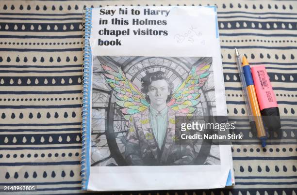 Harry Styles visitors book is displayed at Holmes Chapel Train Station on April 17, 2024 in Holmes Chapel, England. The Holmes Chapel Partnership has...