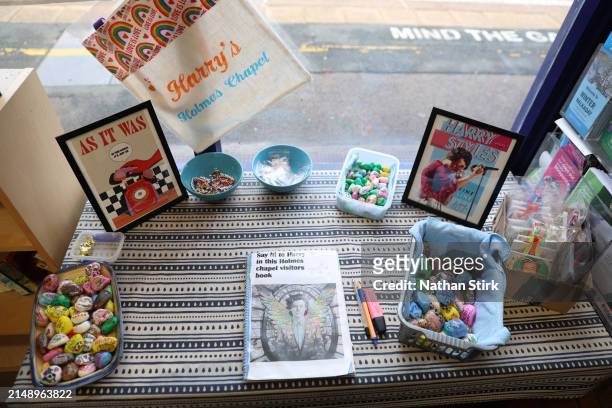 Harry Styles memorabilia is displayed at Holmes Chapel Train Station on April 17, 2024 in Holmes Chapel, England. The Holmes Chapel Partnership has...