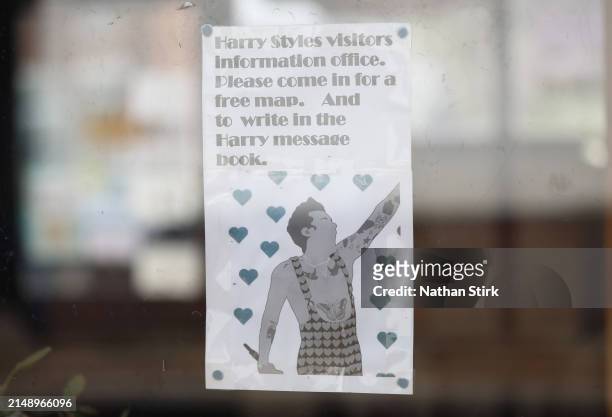 Harry Styles Tour poster is displayed outside Holmes Chapel Train Station on April 17, 2024 in Holmes Chapel, England. The Holmes Chapel Partnership...