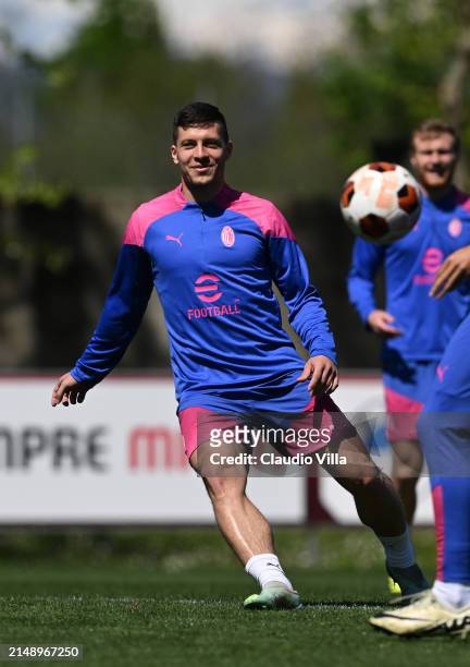 Luka Jovic in action during the UEFA Europa League 2023/24 quarter-final second leg training and press conference at Milanello on April 17, 2024 in...