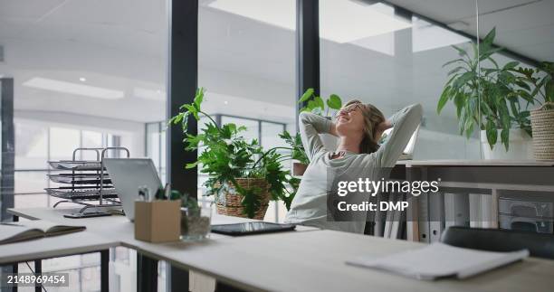 relax, happy and businesswoman with work or project for success or achievement. professional female and smile or rest with hands behind her head and calm breathe for completed proposal in office - hands behind head stock pictures, royalty-free photos & images