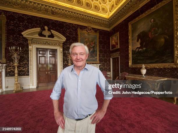 Edward Coke, 7th Earl of Leicester stands in a reception room of Holkham Hall, a country house and seat of the Earls of Leicester, near the village...