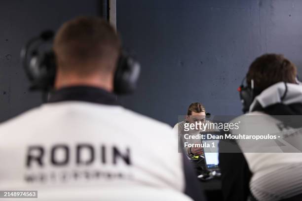 Lola Lovinfosse of France and Rodin Motorsport studies data with Rodin Motorsport team members during F1 Academy Testing at Circuit Zandvoort on...