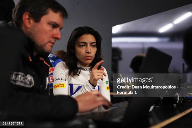Amna Al Qubaisi of United Arab Emirates and MP Motorsport studies data with a MP Motorsport team member during F1 Academy Testing at Circuit...