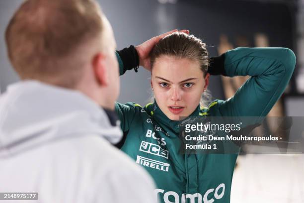 Tina Hausmann of Switzerland and PREMA Racing talks with a PREMA Racing team member during F1 Academy Testing at Circuit Zandvoort on April 17, 2024...
