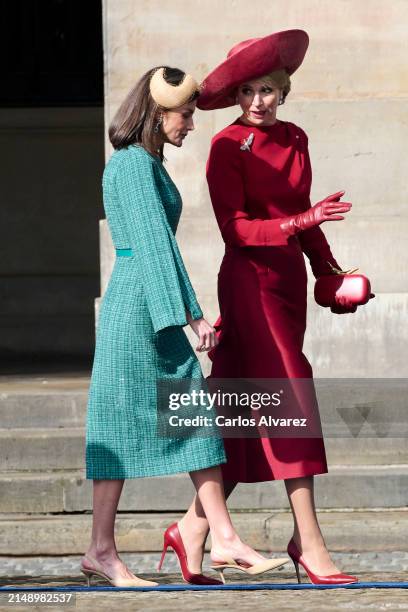 Queen Letizia of Spain speaks with Queen Máxima of the Netherlands as they attend the Welcome Ceremony during day two of her visit to the Netherlands...