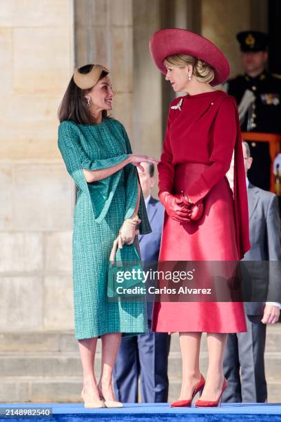 Queen Letizia of Spain speaks with Queen Máxima of the Netherlands as they attend the Welcome Ceremony during day two of her visit to the Netherlands...