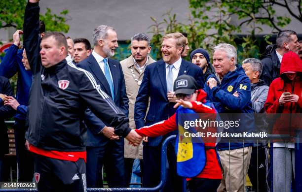King Willem-Alexander of The Netherlands and King Felipe of Spain visit a Cruyff sports court on April 17, 2024 in Amsterdam, Netherlands. The...