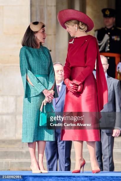 Queen Letizia of Spain speaks with Queen Máxima of the Netherlands as they attend the Welcome Ceremony during day two of her visit to the Netherlands...