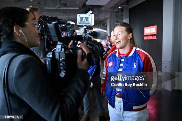 Daniela Moroz speaks to press as U.S.A. Olympians and Paralympians Light the Empire State Building to Mark 100 Days Out from the Olympics at The...